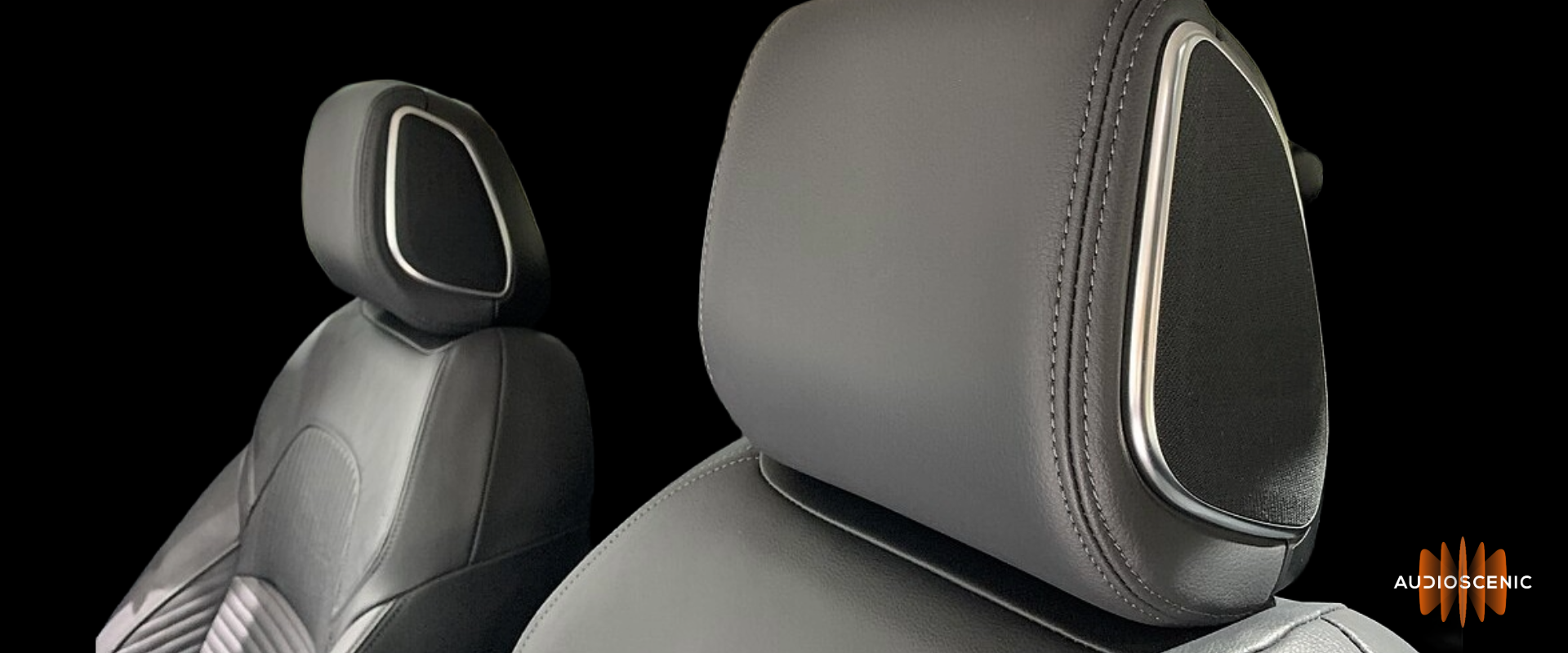 Image showing speakers embedded into headrest of a car